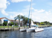 A trimaran navigates the PGI canal system.